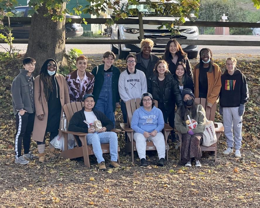 Photo of staff from the LGBT and Women's Centers outside beneath a tree.